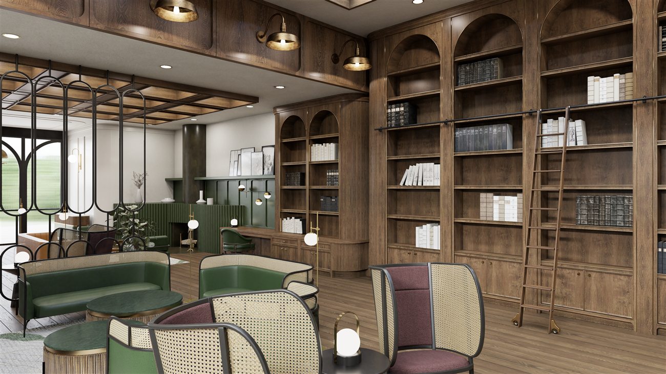 Chapter House library: arched timber bookcases with a rolling ladder, green settees, cane armchairs and a coffered ceiling