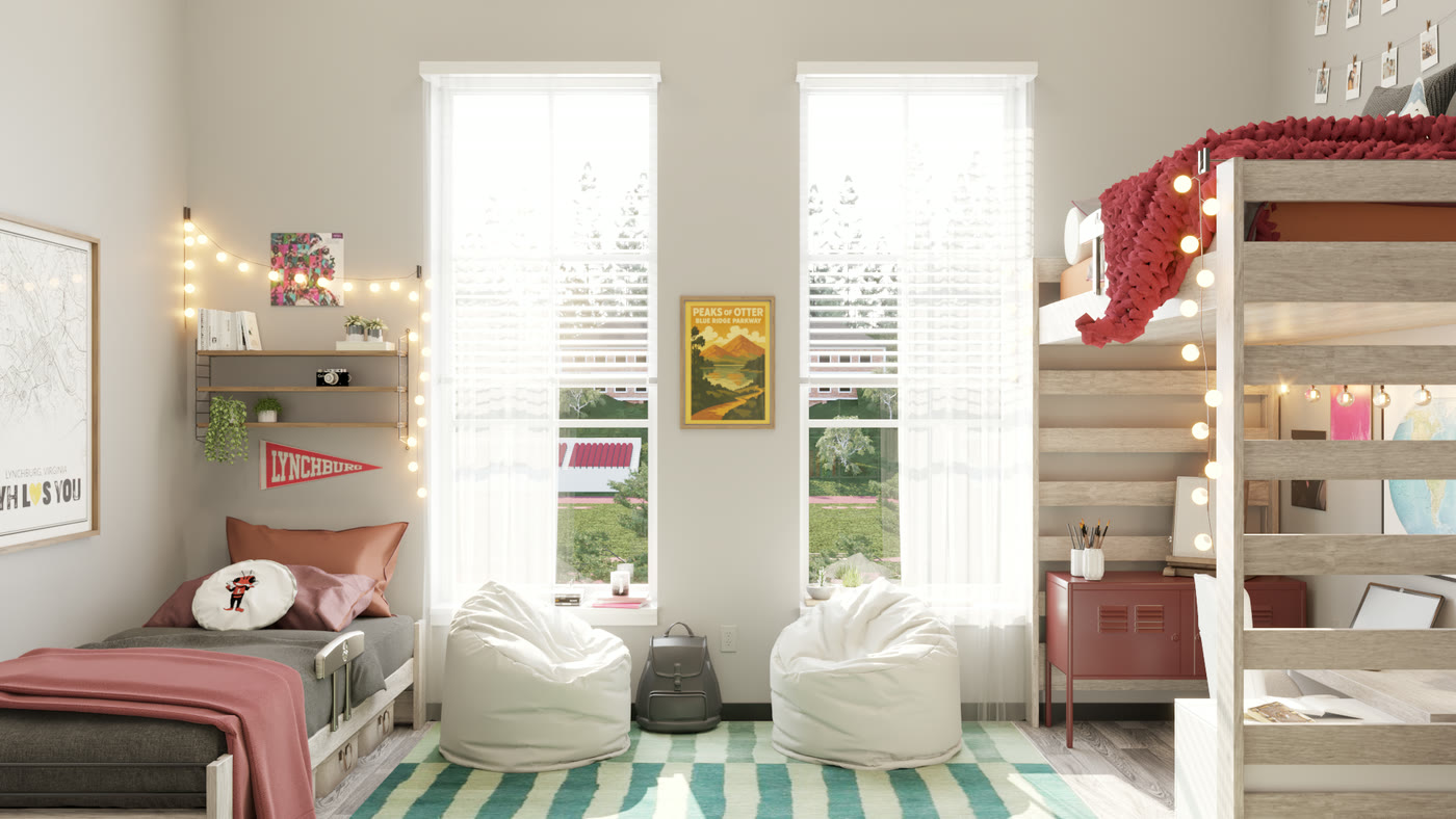 A staged student bedroom seen from the door, with two tall windows and a loft bed