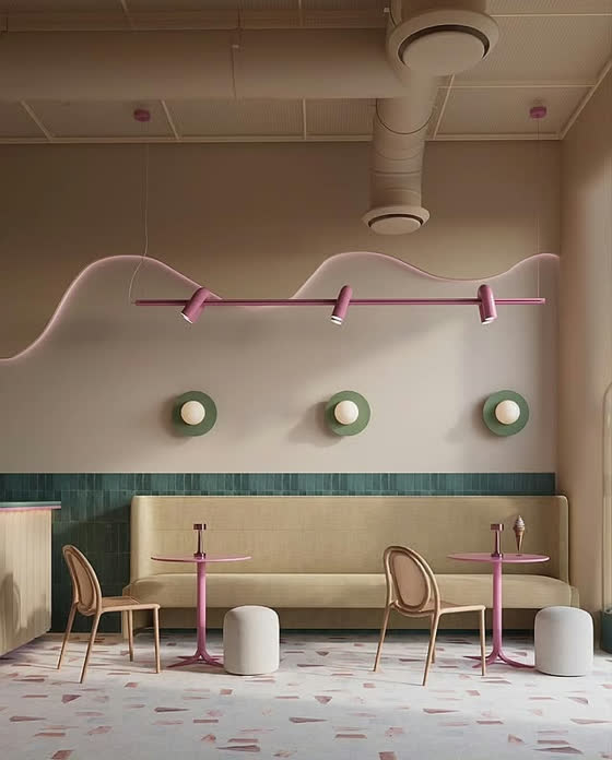A cafe in mint tile and sand with pink tube lighting and green wall lights