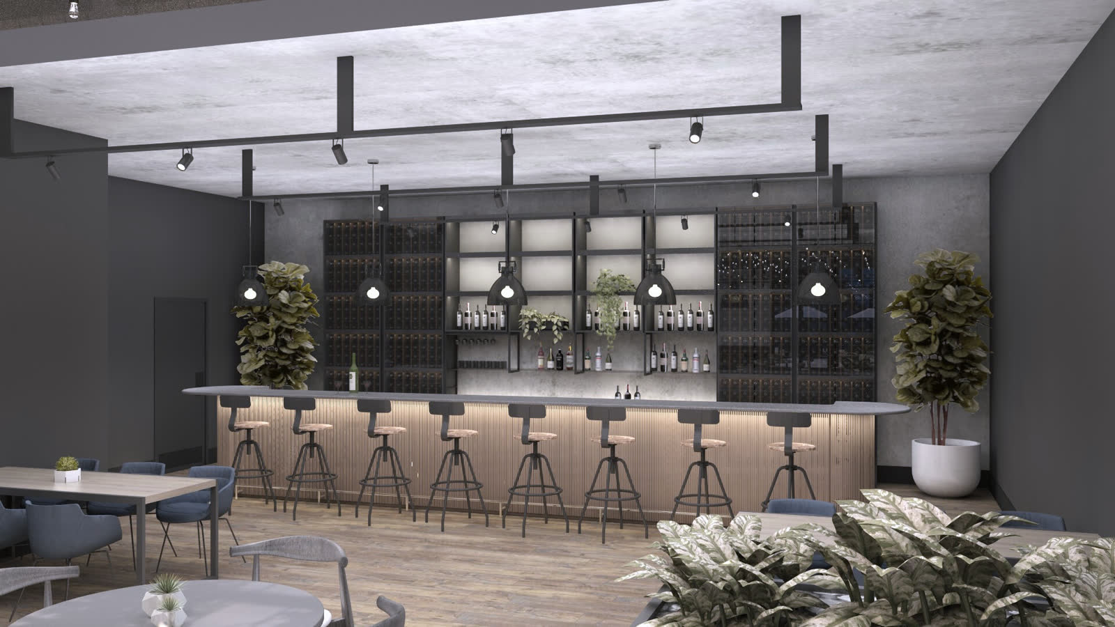 The bar in the food hall: timber front, dark counter, stools, a lit back bar