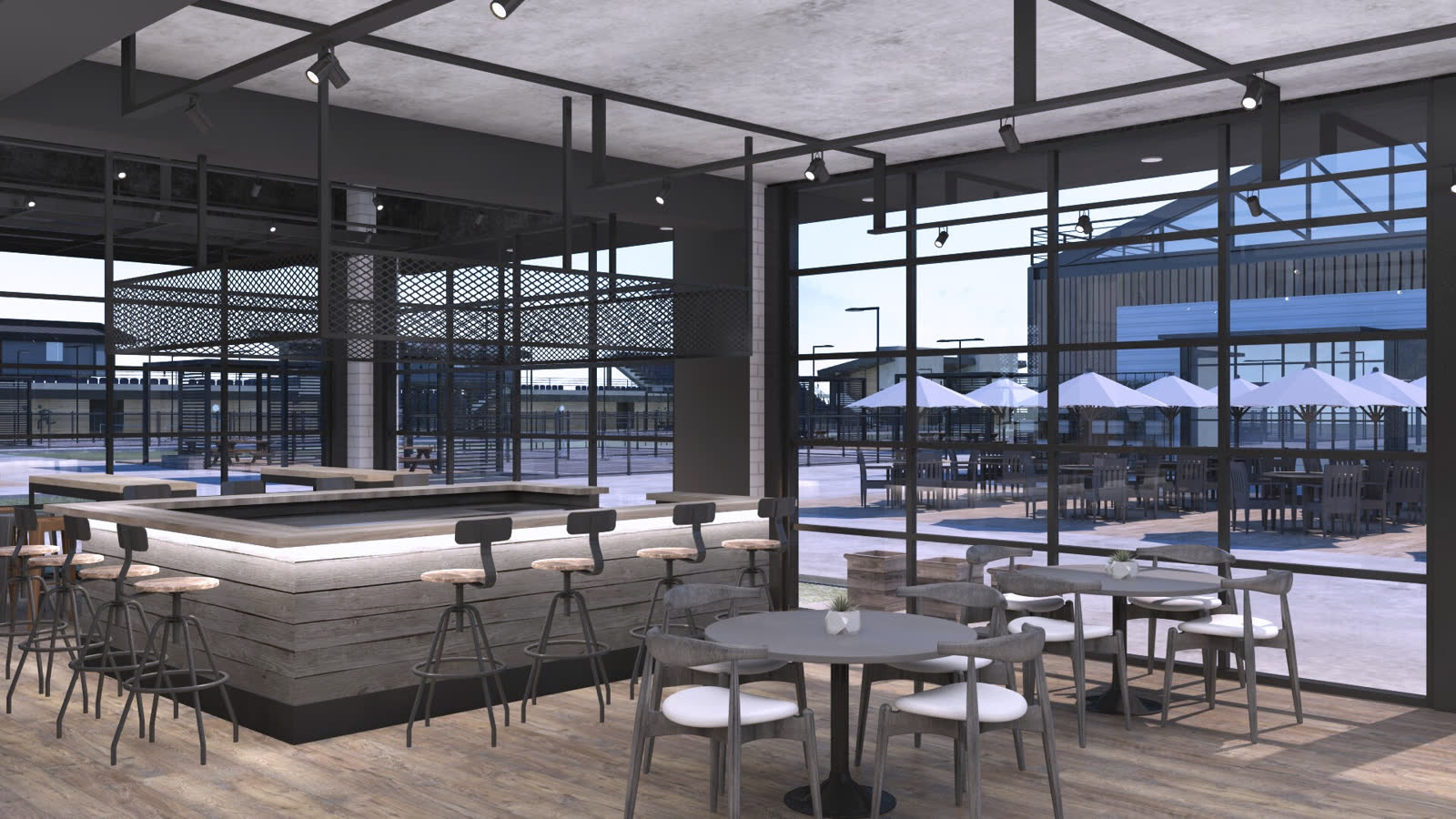 The food hall bar seen against the glass wall, courts and umbrellas outside