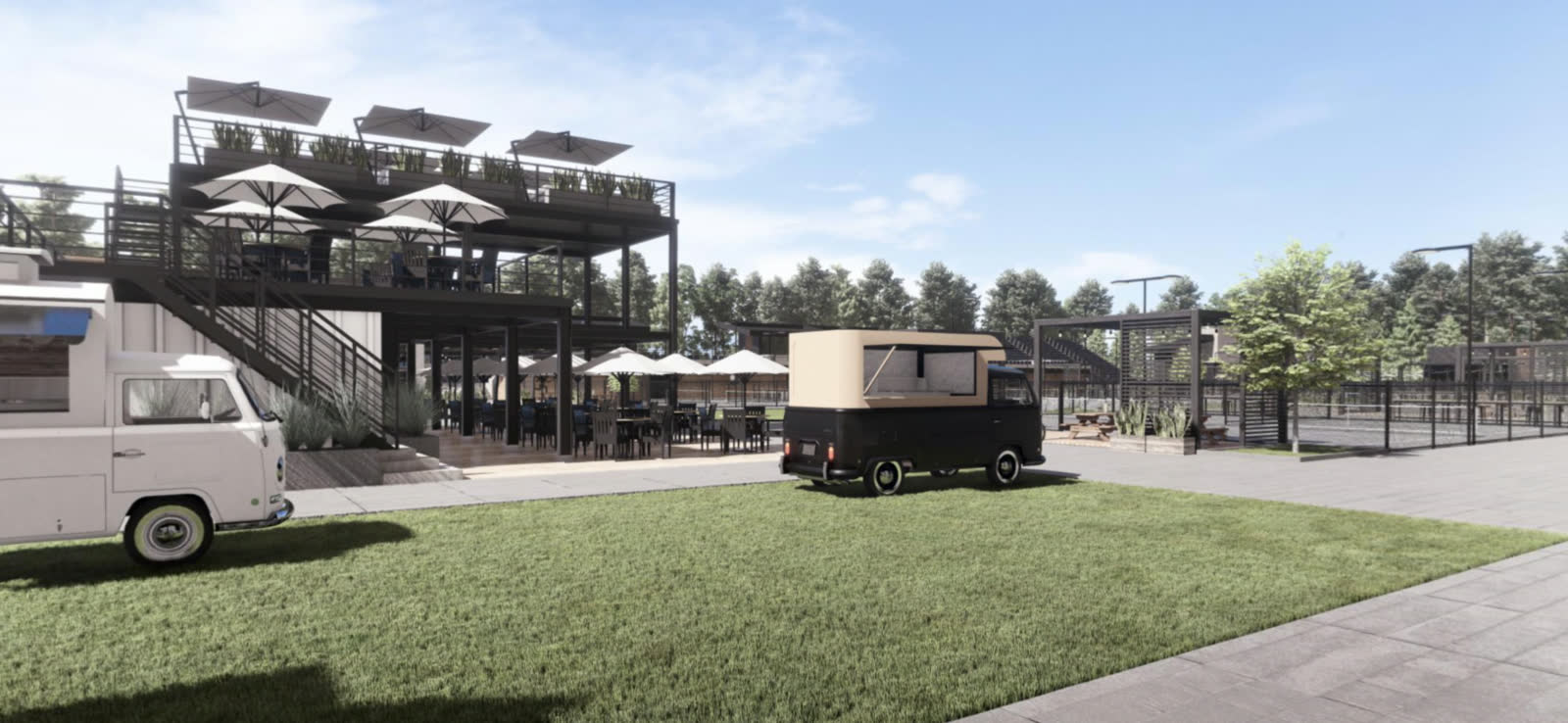 A cart under a canvas canopy in the food truck yard