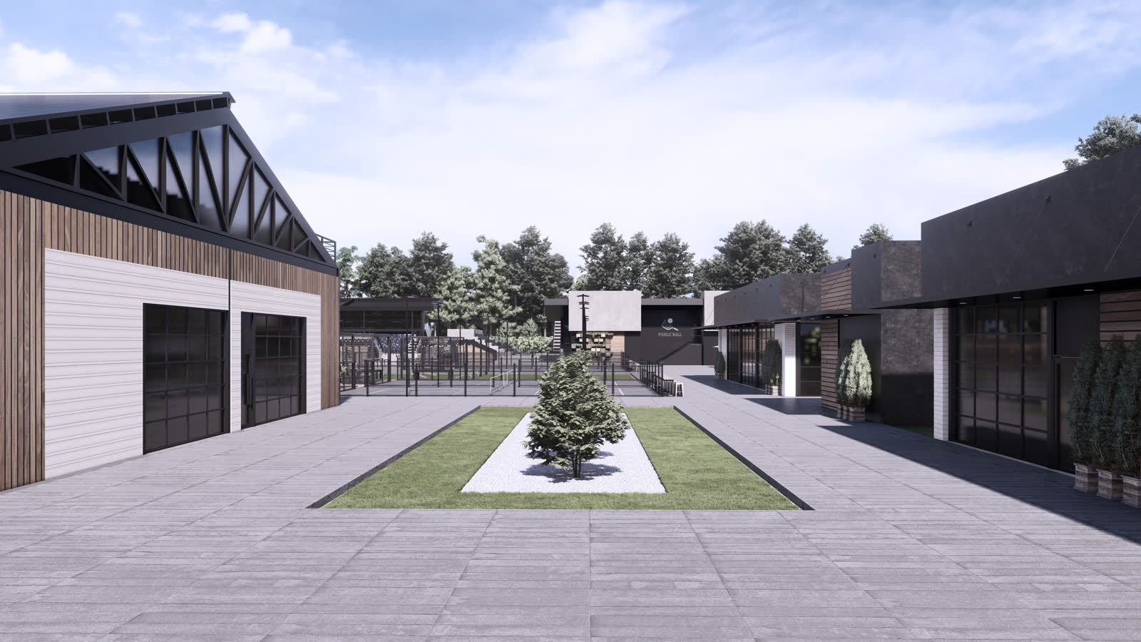 The garden: a paved court with a single tree in a square lawn between the buildings