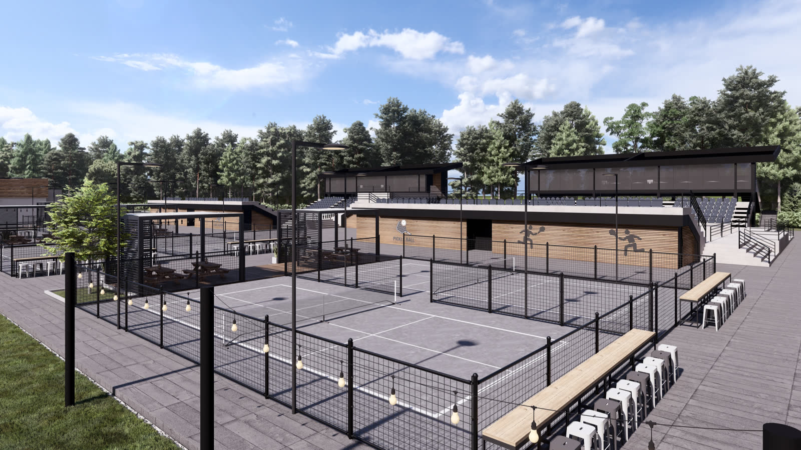 The outdoor courts: fenced courts with lights on tall poles, benches along the fence, the club buildings behind