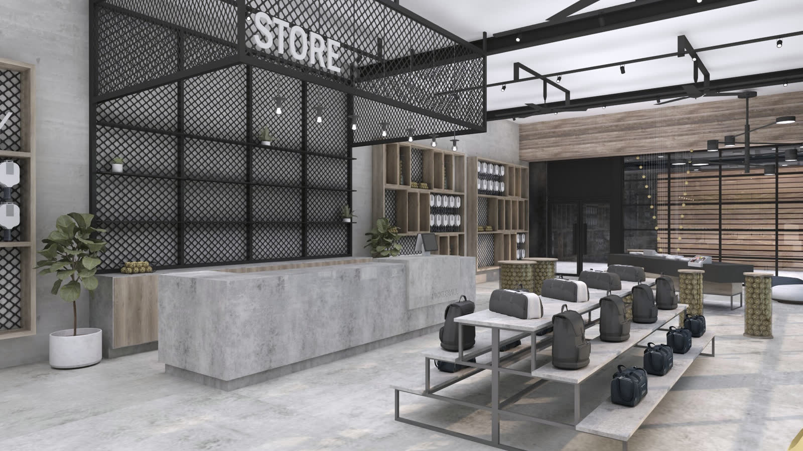 The store: STORE in steel letters over a mesh screen, concrete plinths of shoes and paddles, pickleballs on the shelves