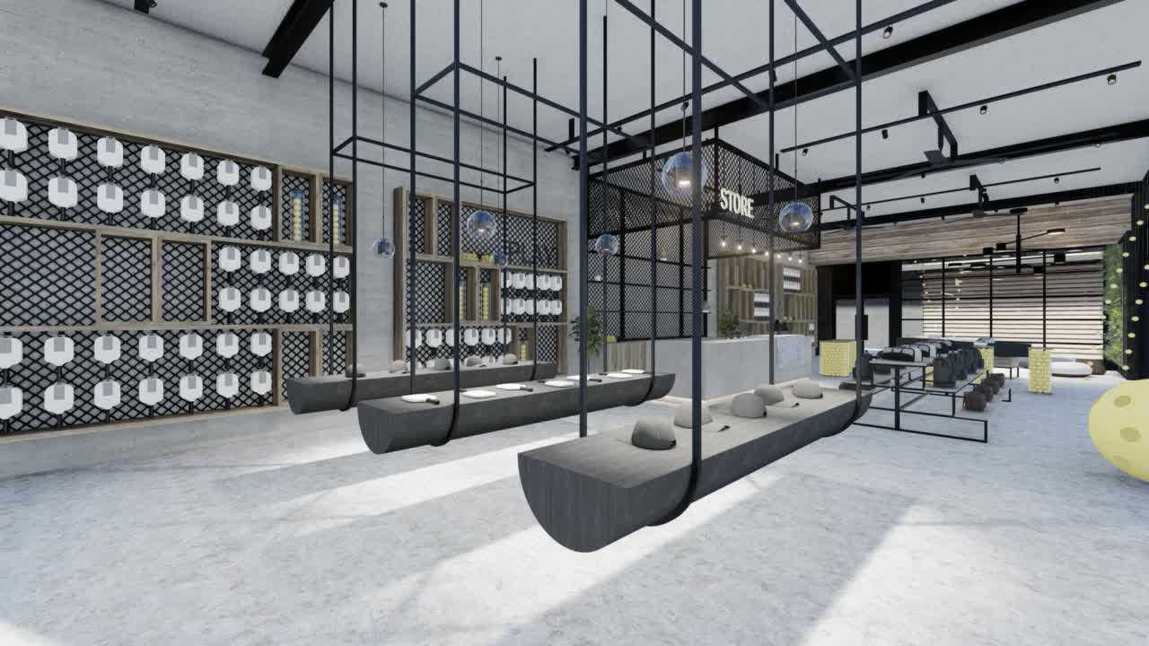 A wall of paddles on a mesh screen in the store, timber shelves, dark ceiling