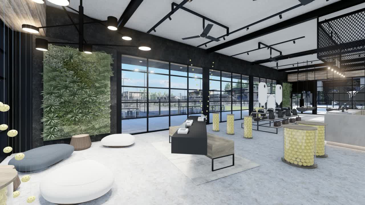 The store looking out through the glass, a living wall and yellow stools