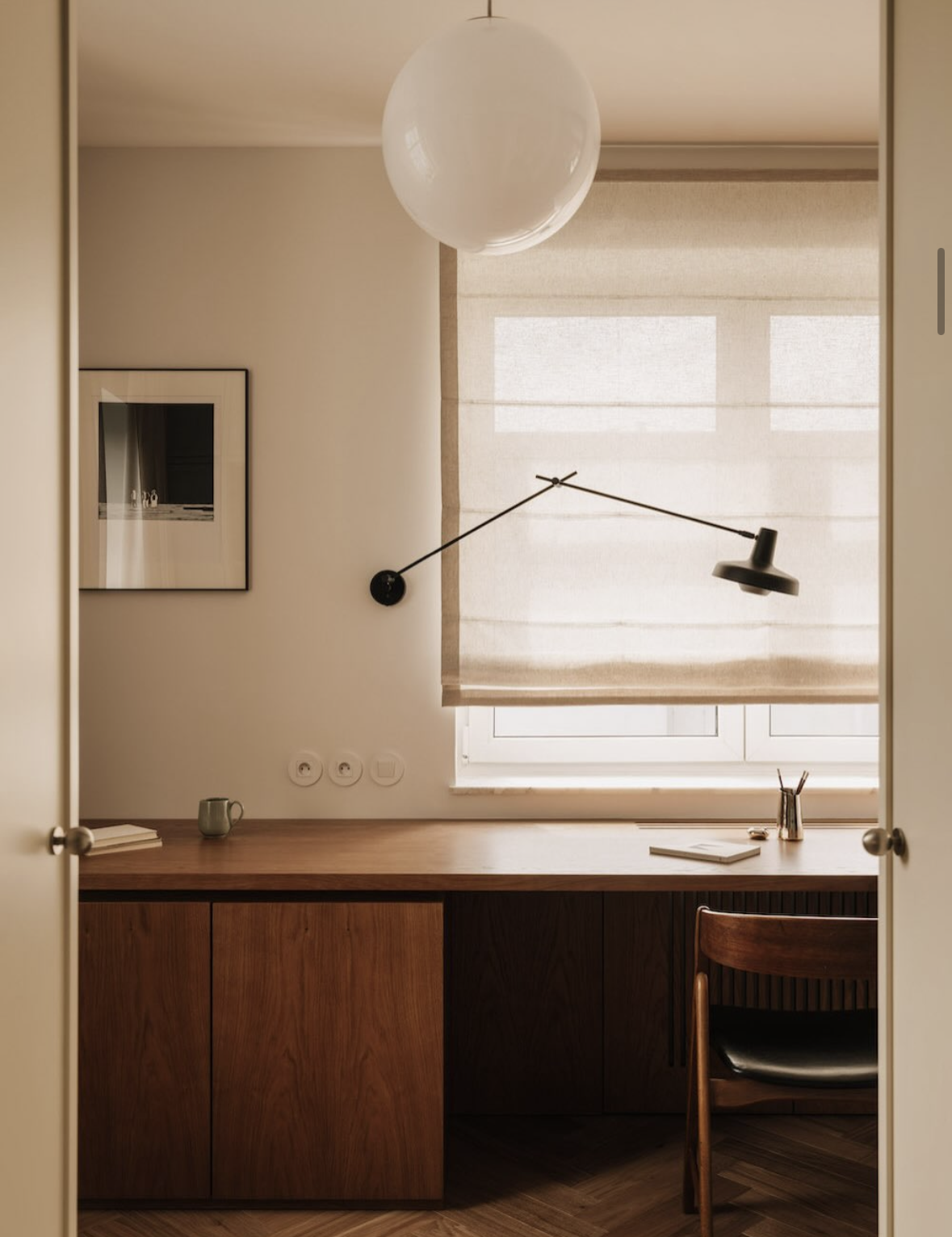 Office or studio, Walnut desk, paper globe, blind, minimal