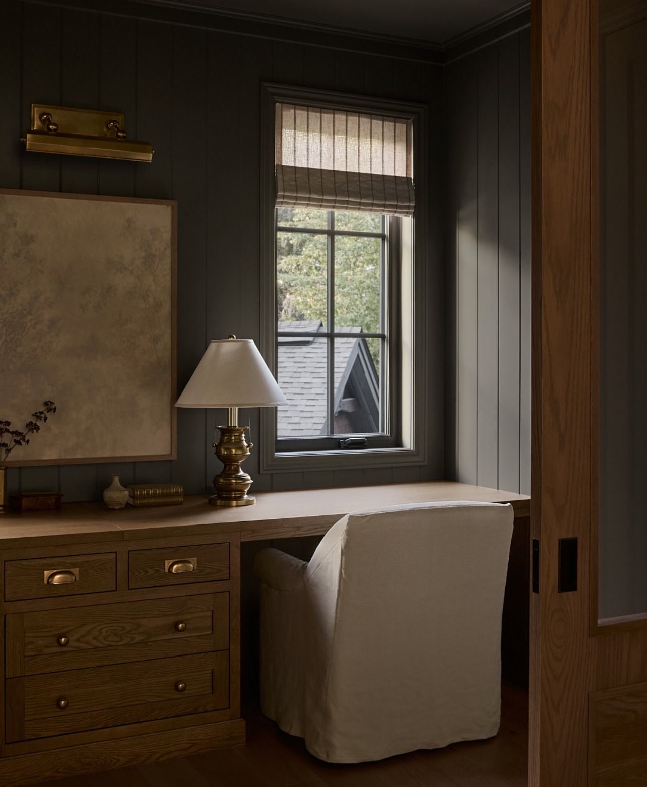 Office or studio, Olive panelled desk, slipcover chair, lamp, calm