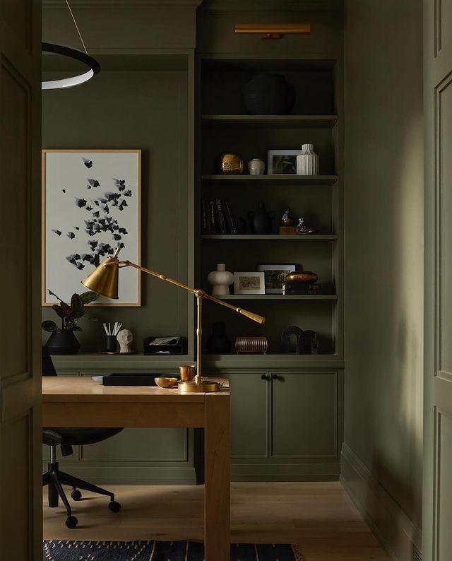 Office or studio, Green shelving desk, brass lamp, modern
