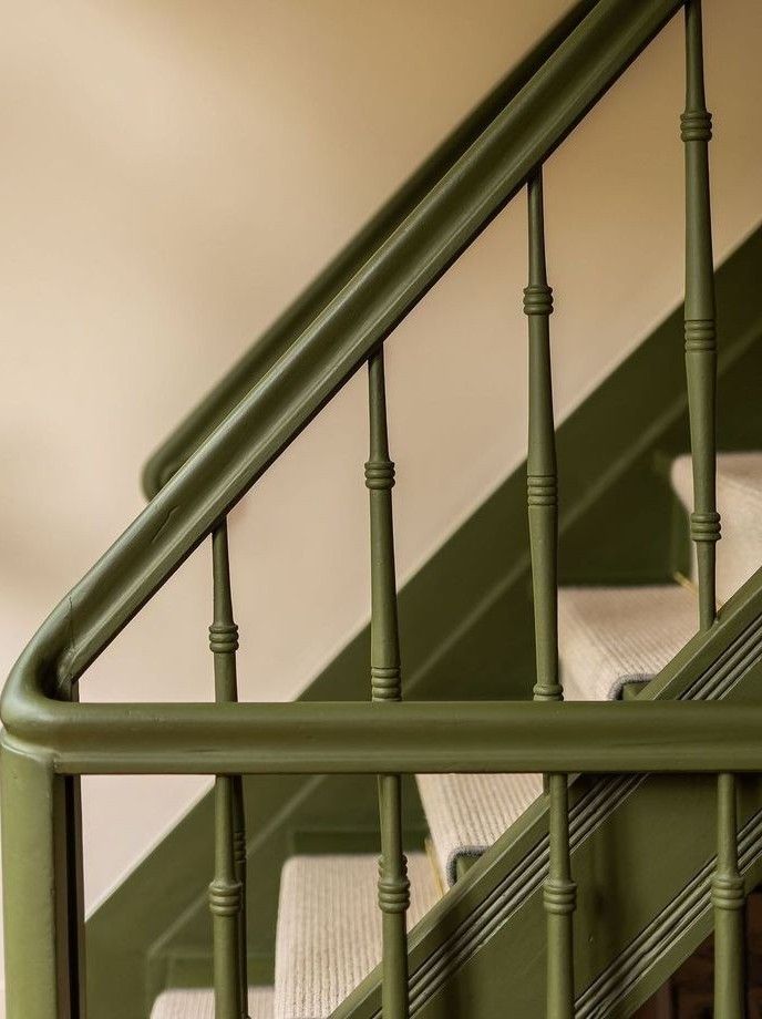 Foyer or stair, Green painted stair rail, pale runner, classic