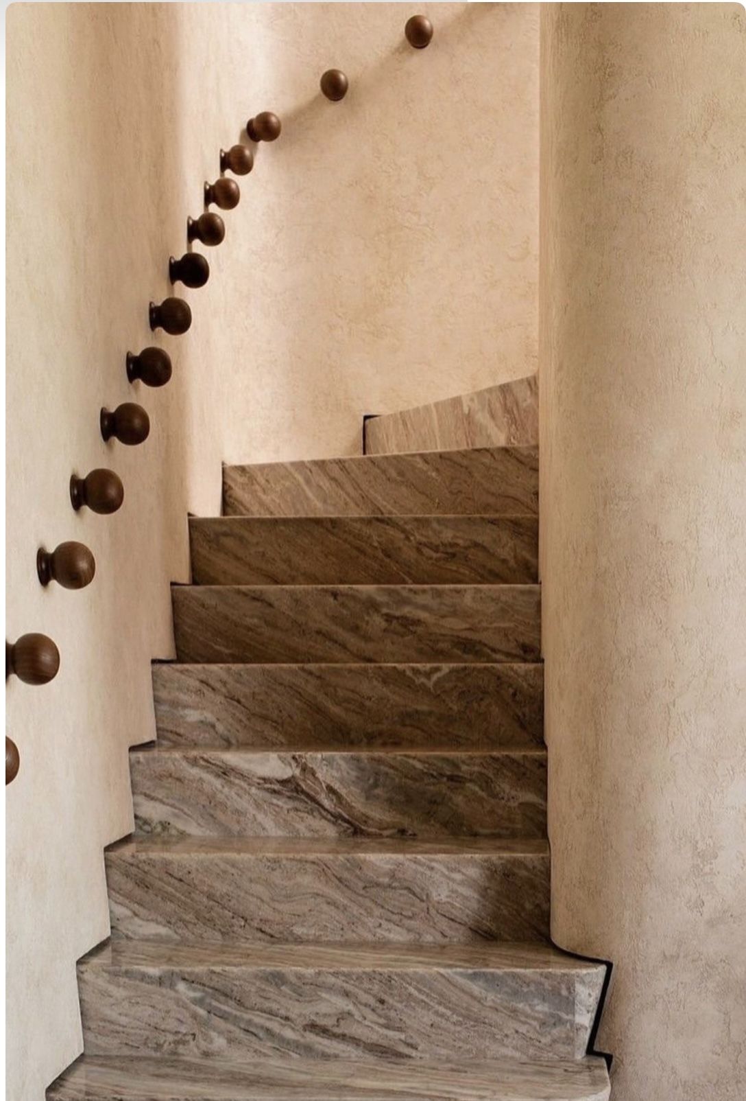 Foyer or stair, Travertine stair, timber ball handrail, wabi sabi