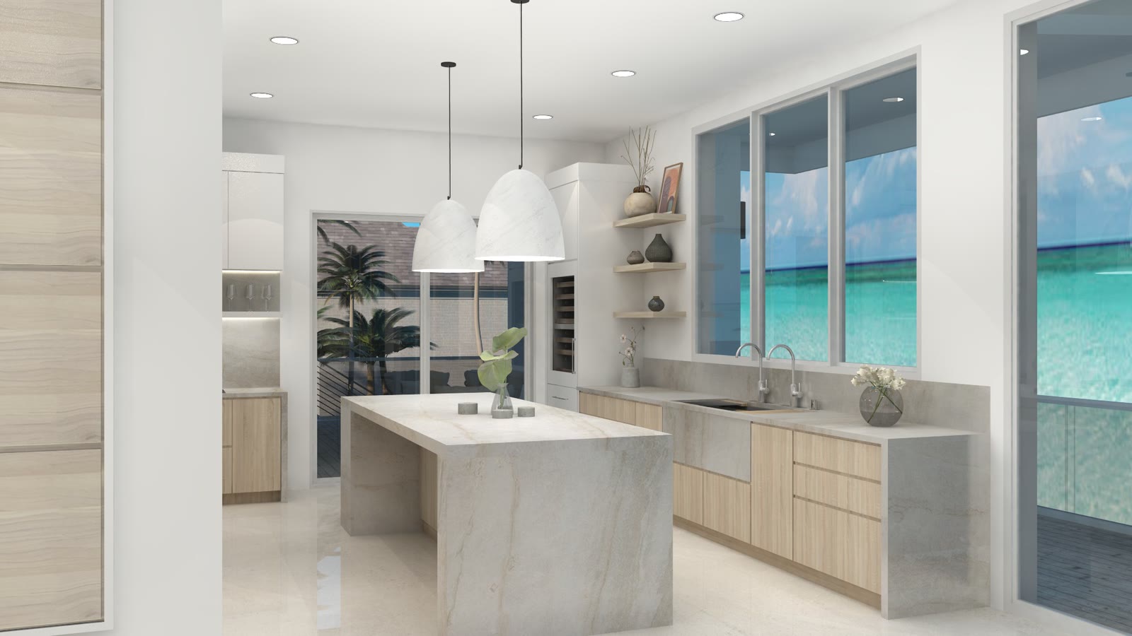 The kitchen looking out, marble island and pale timber against the sea