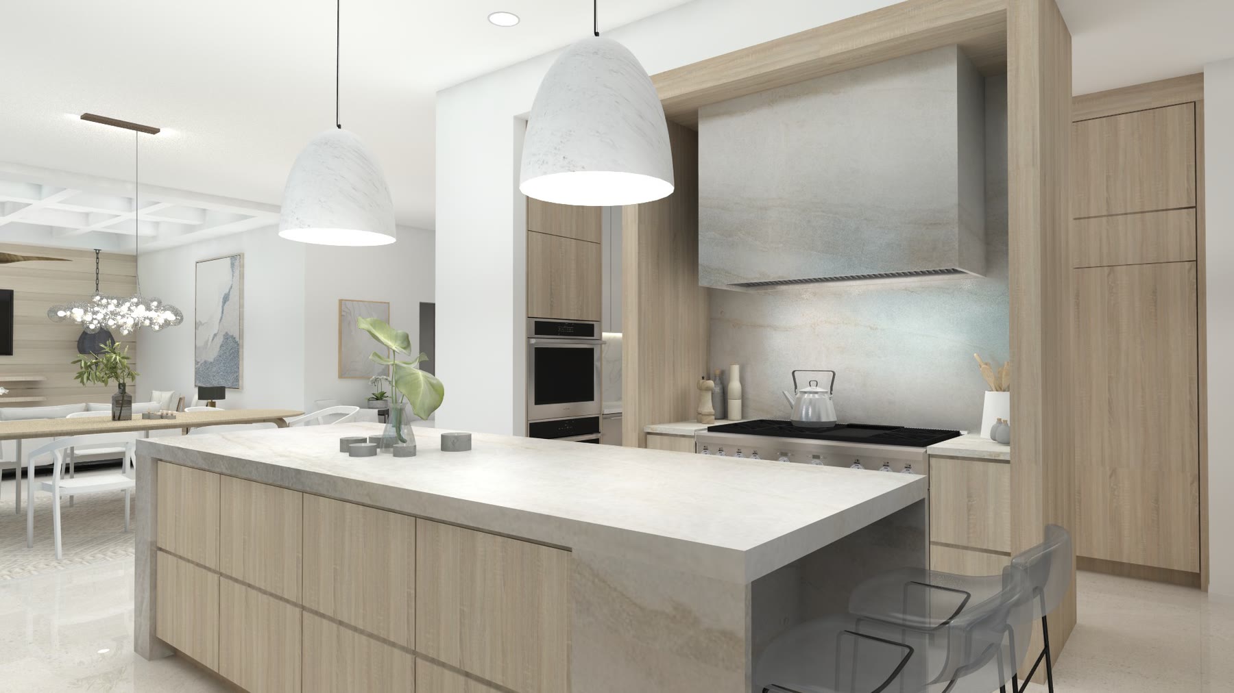 The kitchen at Waterfront Residence, a marble island under paired pendants against full height glazing to the sea